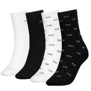 Calvin Klein Strømper 4P Holiday Pack Aop Socks Svart/Hvit One Size Da...