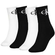 Calvin Klein Strømper 4P Monogram Socks Gift Box Svart/Hvit One Size D...