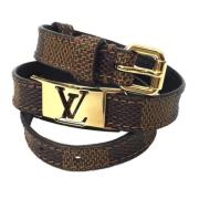 Pre-owned Brunt stoff Louis Vuitton armbånd