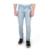 Slim Fit Jeans i ensfarget med knapp og glidelås