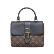 Pre-owned Brunt skinn Louis Vuitton veske