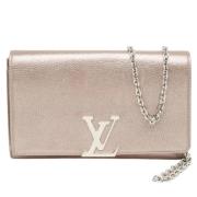 Pre-owned Louis Vuitton-clutch i metallisk skinn