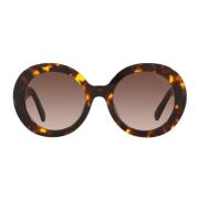 Runde solbriller med brune gradientlinser og gulllogo