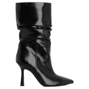Klassiske svarte høyhælte støvler