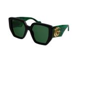 Firkantet svart solbriller med grønne linser