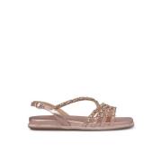 Flat sandal med krysset rhinestones