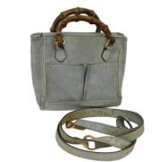 Pre-owned Suede handbags