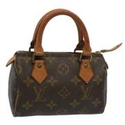 Pre-owned Canvas handbags