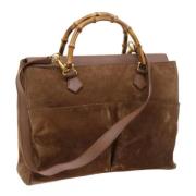 Pre-owned Suede handbags