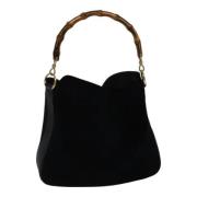 Pre-owned Suede handbags