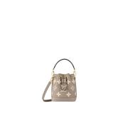 Miniatyr Noé Monogram Empreinte Skinnveske