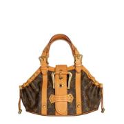 Pre-owned Suede handbags