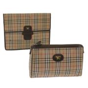 Pre-owned Canvas clutches