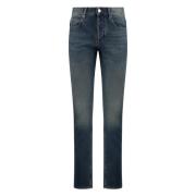 Stretch bomull slim-fit jeans med metallknapper