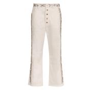 Flared Rhinestone Jeans med Frynset Hem