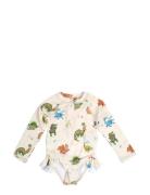 Vilje – Uv-Dragt 1-2 År – Dino Beach Cream Filibabba