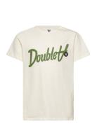 Ola Junior Script & Badge T-Shirt Tops T-shirts Short-sleeved Cream Wo...