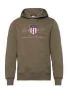 Reg Archive Shield Hoodie Tops Sweat-shirts & Hoodies Hoodies Green GA...