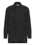 Runsas Piirto Unikko Tops Shirts Long-sleeved Black Marimekko