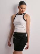 Juicy Couture - Miniskjørt - Black - Robbie Pocket Mini Skirt - Skjørt...