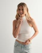 Nelly - Hvit - Sleeveless Polo Top