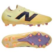 New Balance Tekela V4 Pro Low FG Energy Rush - Pergament/Svart/Oransje