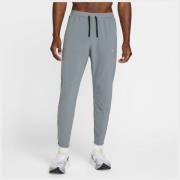 Nike treningsbukser Dri-FIT Stride Woven - Grå/Sølv